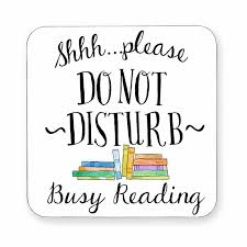 Black lettering on a white background that says Shhh . . . please do not disturb. Busy reading.