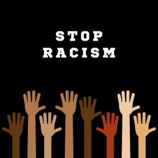 The words Stop Racism on a black backcround with raised hands in different skin tones