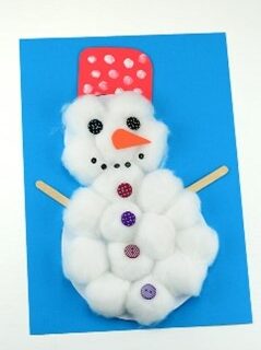 Snowperson craft made with cottonballs on paper and red paper hat