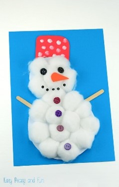 Snowperson craft made with cottonballs on paper and red paper hat