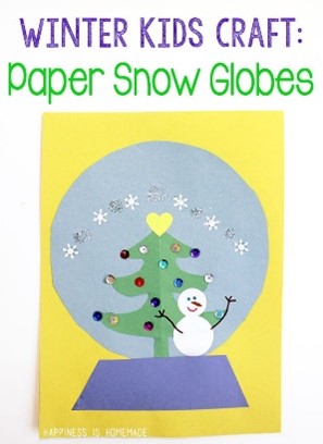 Blue paper snowglobe with a Christamas tree in it on a yellow paper background